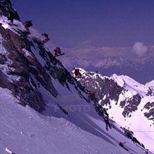 N-Z rider Craig Anderton spins off a cliff. Photo: Yves Garneau. Rider: Craig Anderton.